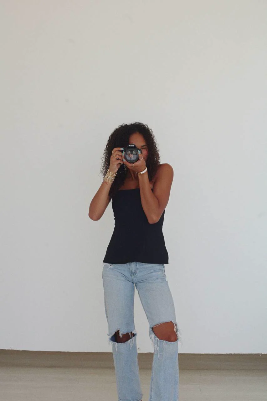 Kendall holding her Canon camera