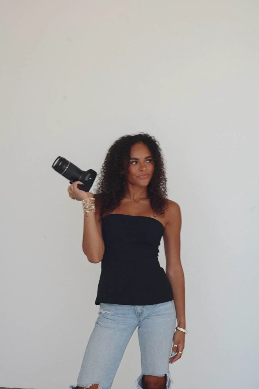 Kendall holding her camera near her shoulder