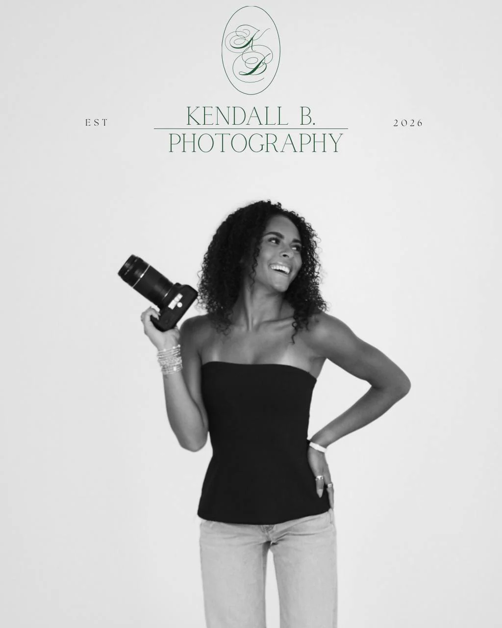 Kendall smiling with her camera under the Kendall B. Photography wordmark