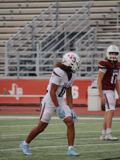 Two football players set before the next play